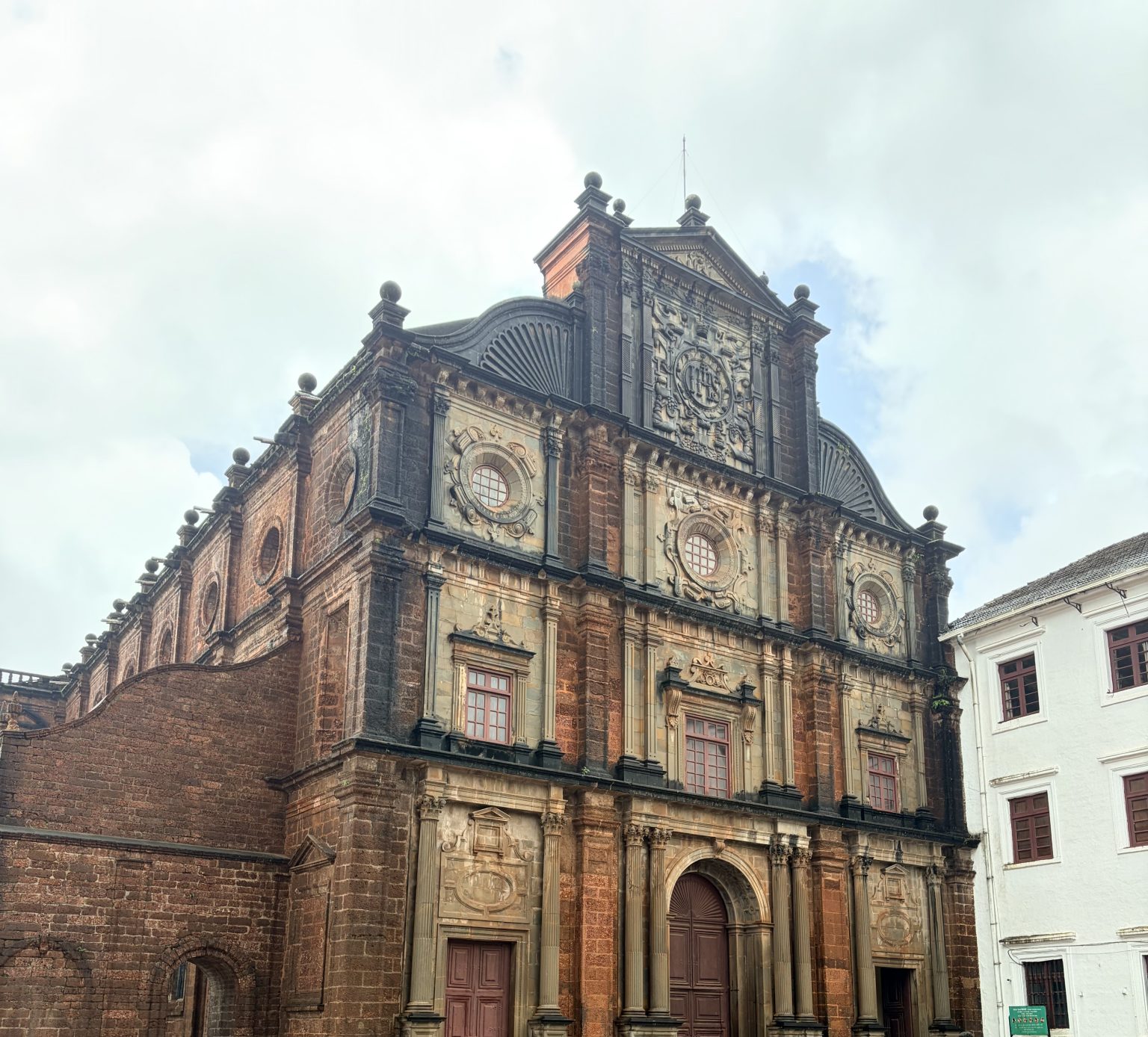 Front view of the Basilica of Bom Jesus in Old Goa, showcasing its historic Portuguese architecture